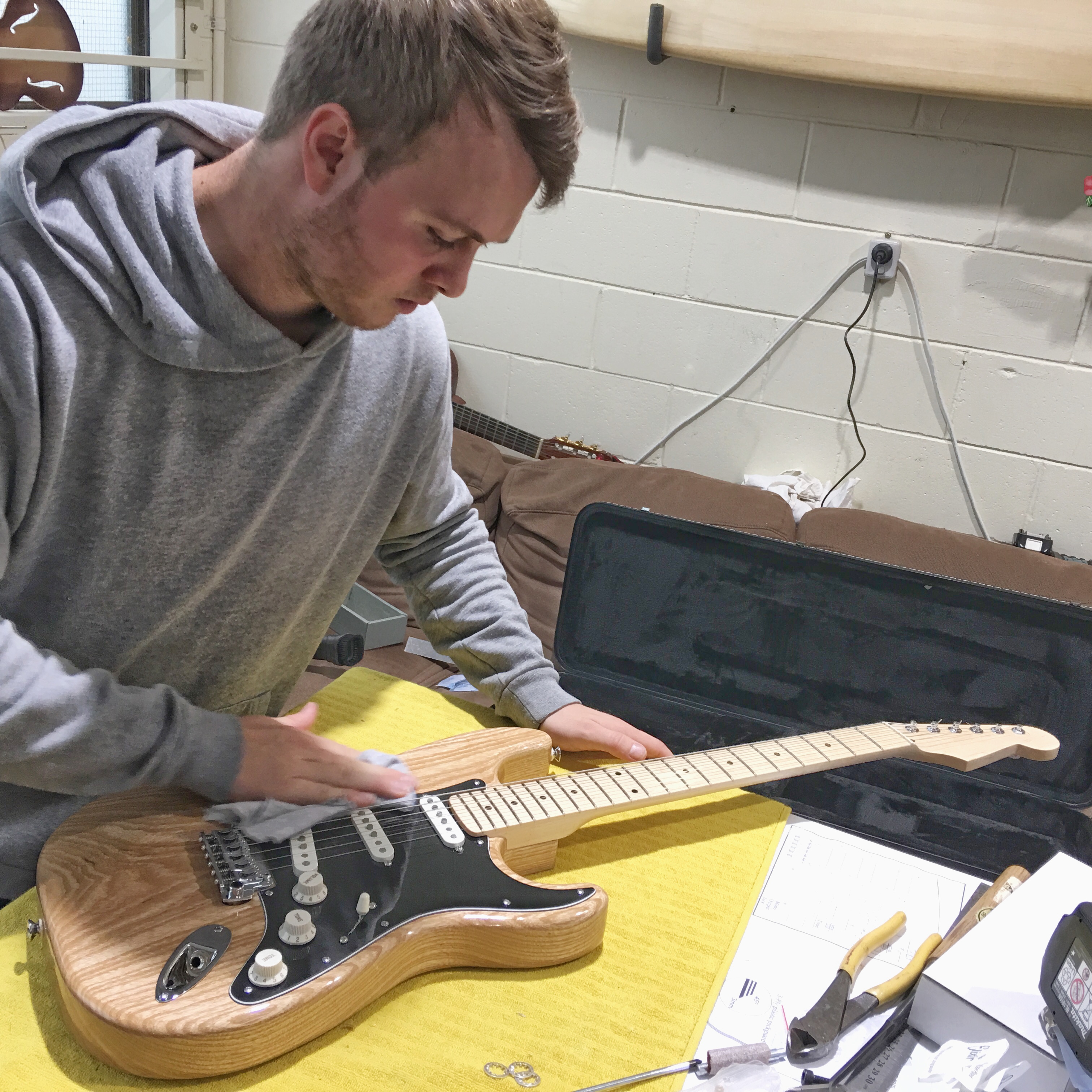 Jamie with his Strat-style electric guitar